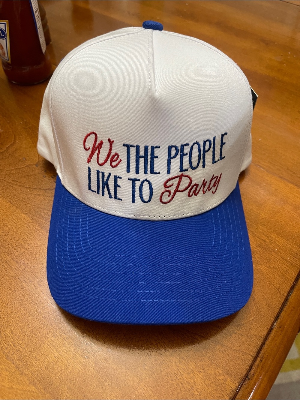 C.C White and Blue Embroidered Trucker Cap